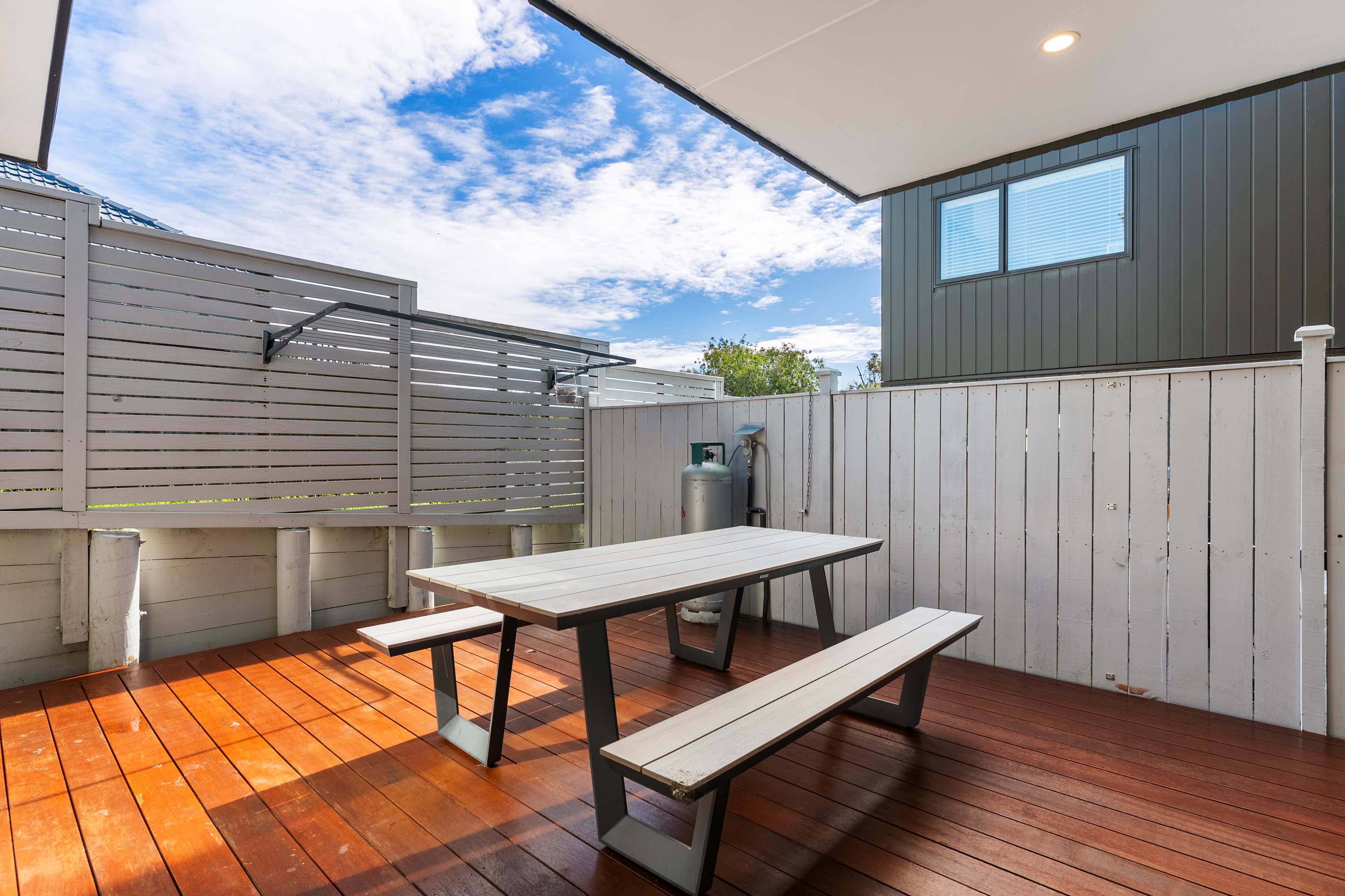 Sunny rear deck with seating
